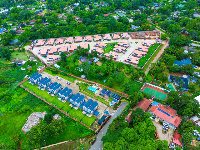 Aerial view of landscaped buildings and grounds