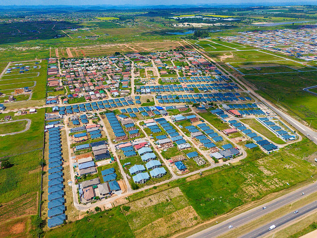 Aerial property photograph with roads and green space
