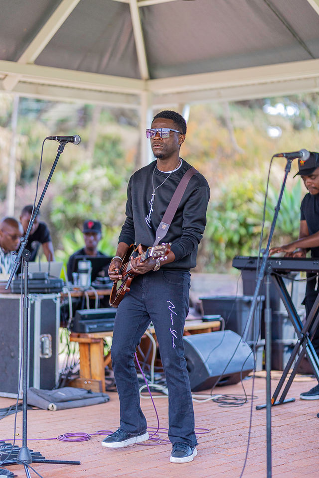Live vocalist performing at an outdoor music event